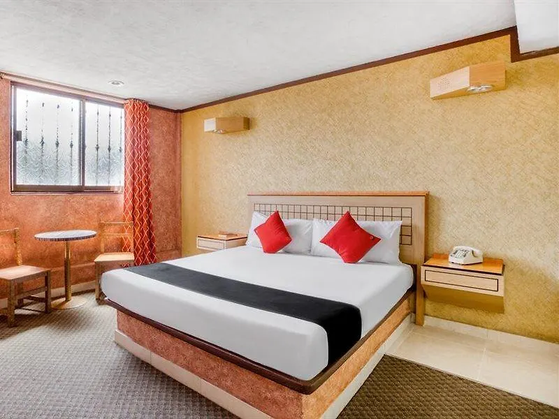 **  Capital O Hotel Valencia Puebla Mexico