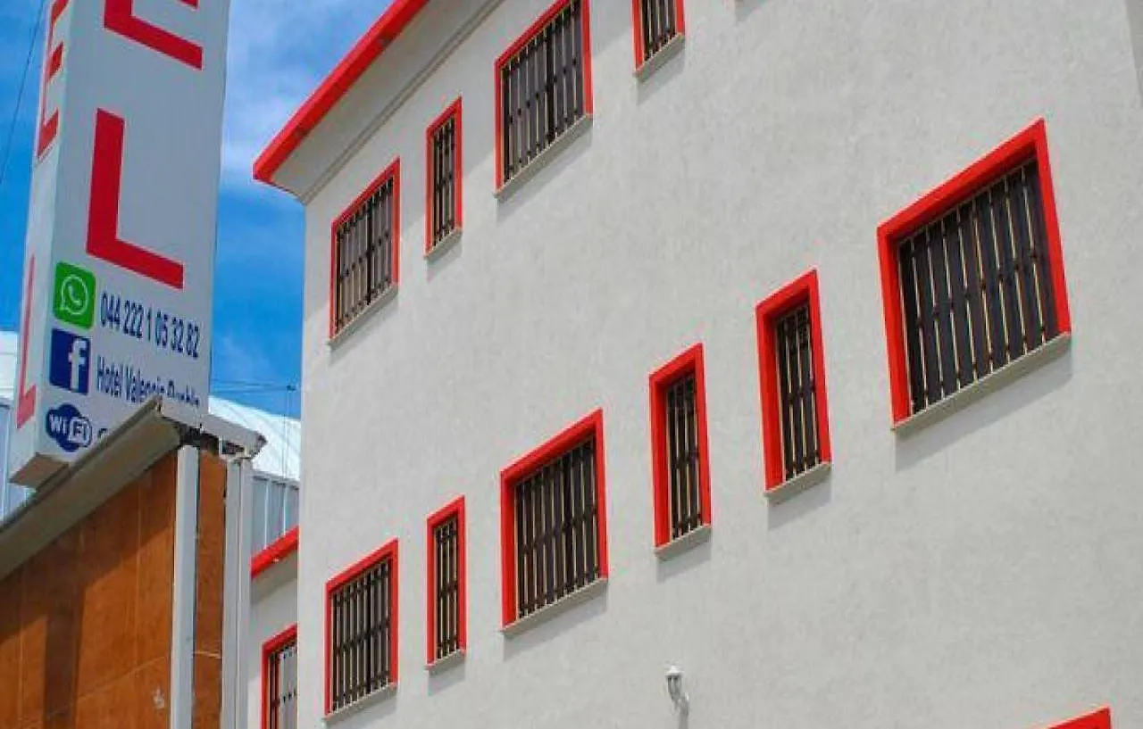Capital O Hotel Valencia Puebla