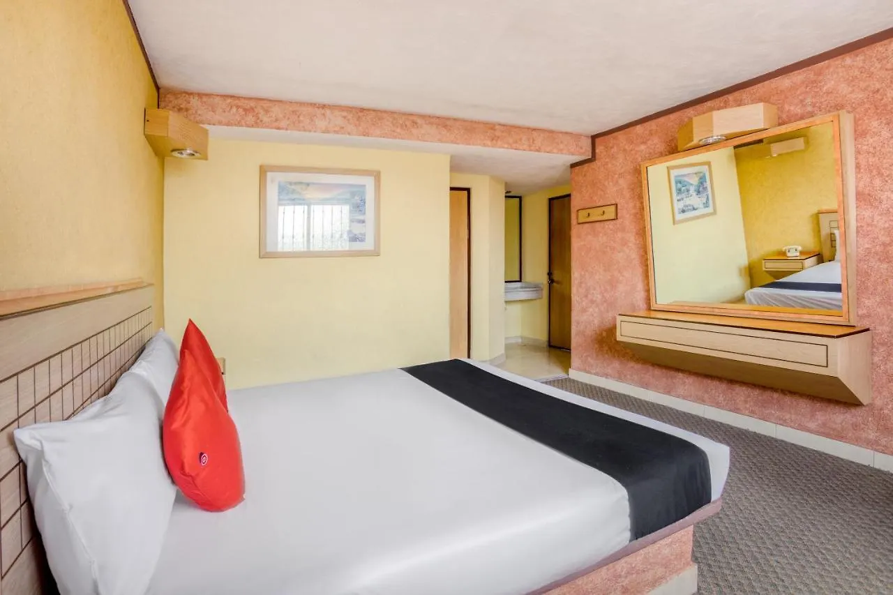 Capital O Hotel Valencia Puebla